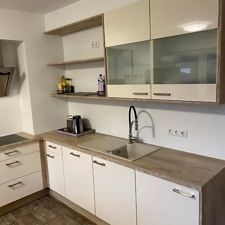 Проживание в семье Haus Am Sandhuegel